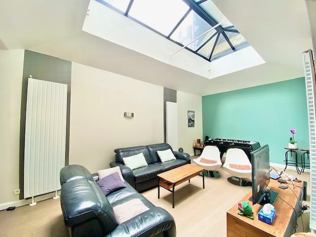 à vendre Original appartement duplex ,esprit contemporain, de 160 m2  habitable avec  2 parkings  et cave